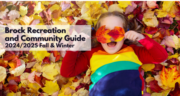 Picture of a girl laying in a leaf pile