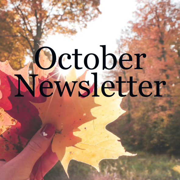 a hand holding up fallen maple leaves; txt reads october newsletter